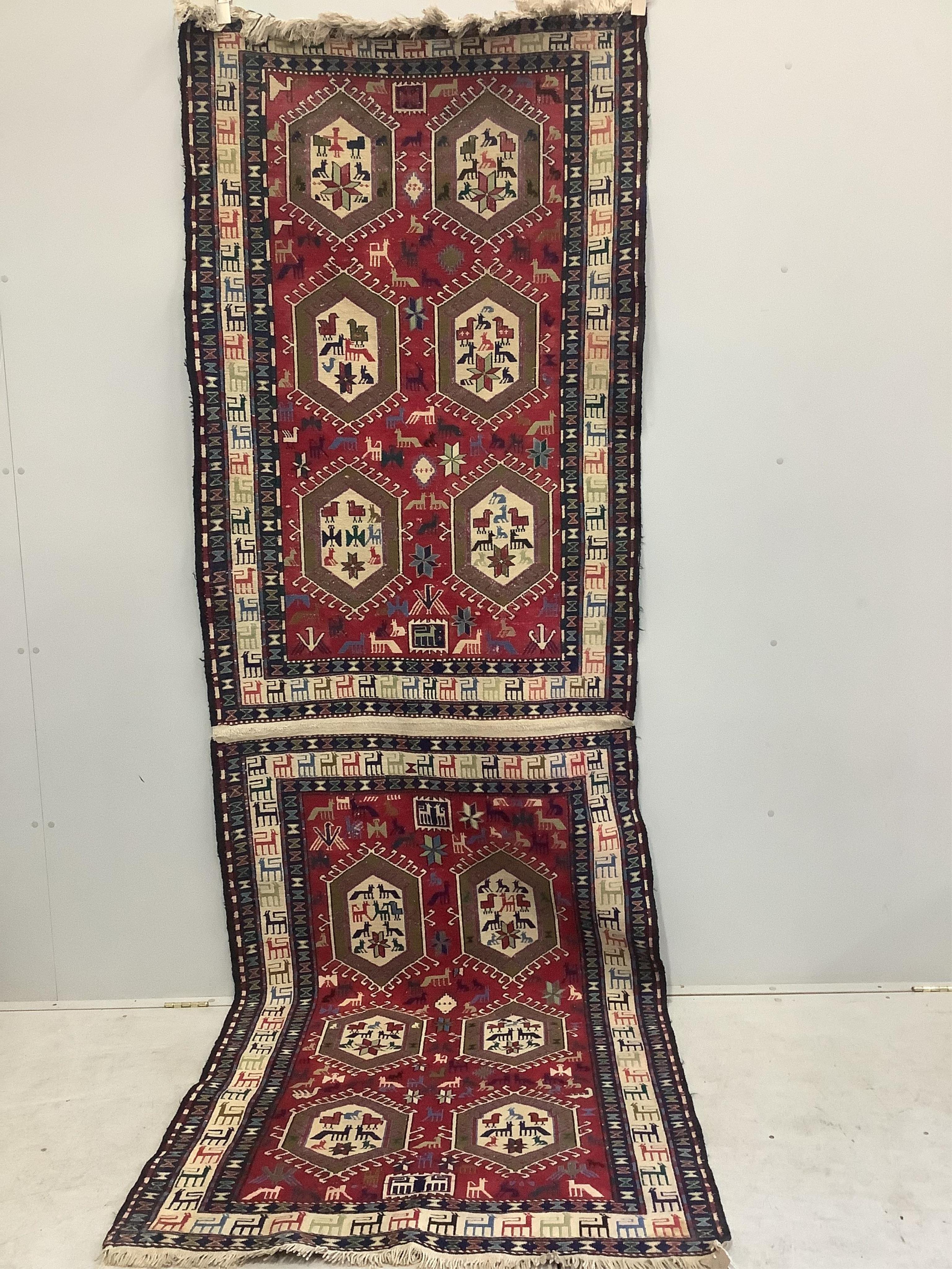 A Soumak flatweave rug, approximately 320 x 108cm. Condition - good